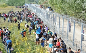 Refugees at the Hungarian/Serbia border fence